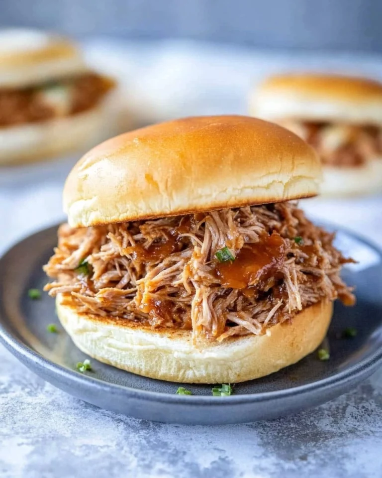 Slow-Cooker-Pulled-Pork-Tender-Shredded-Pork-Sandwiches-Recipe